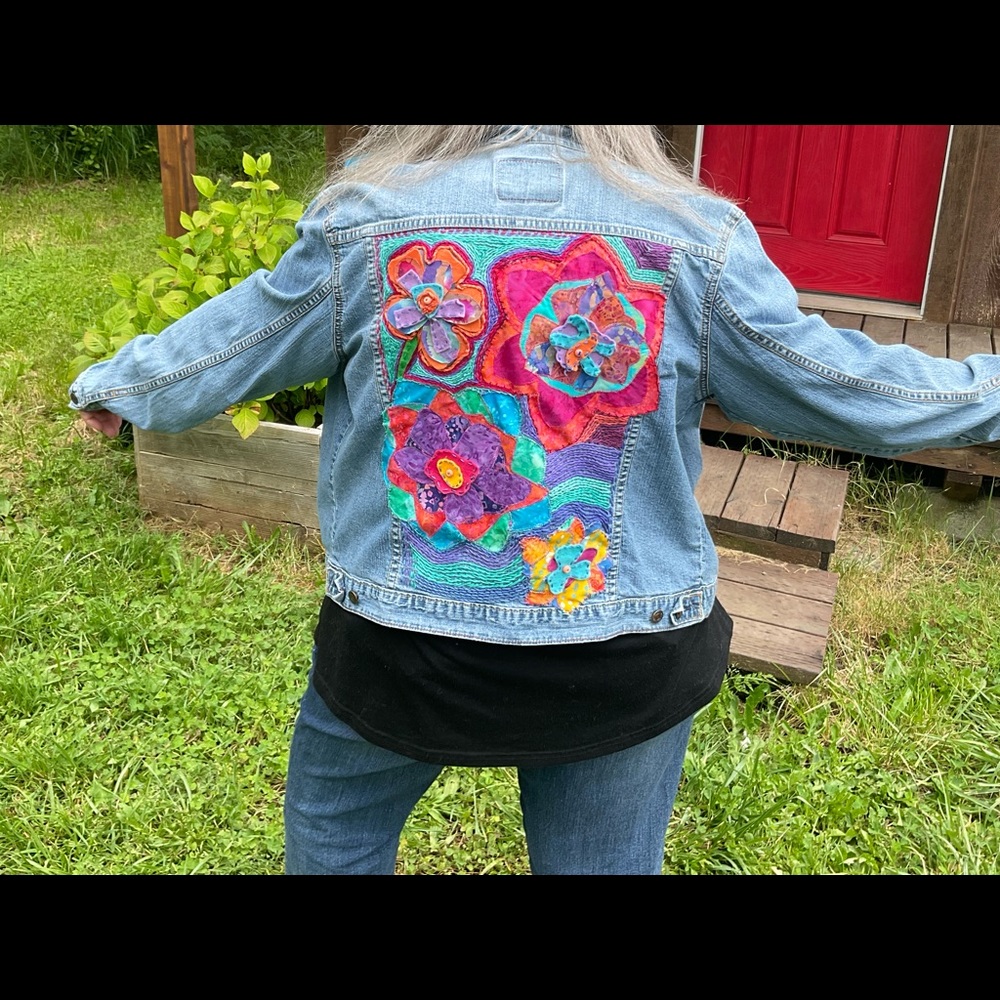 Whimsical HAND DESIGNED LEVI upcycled Jean jacket. Boho unique colorful!